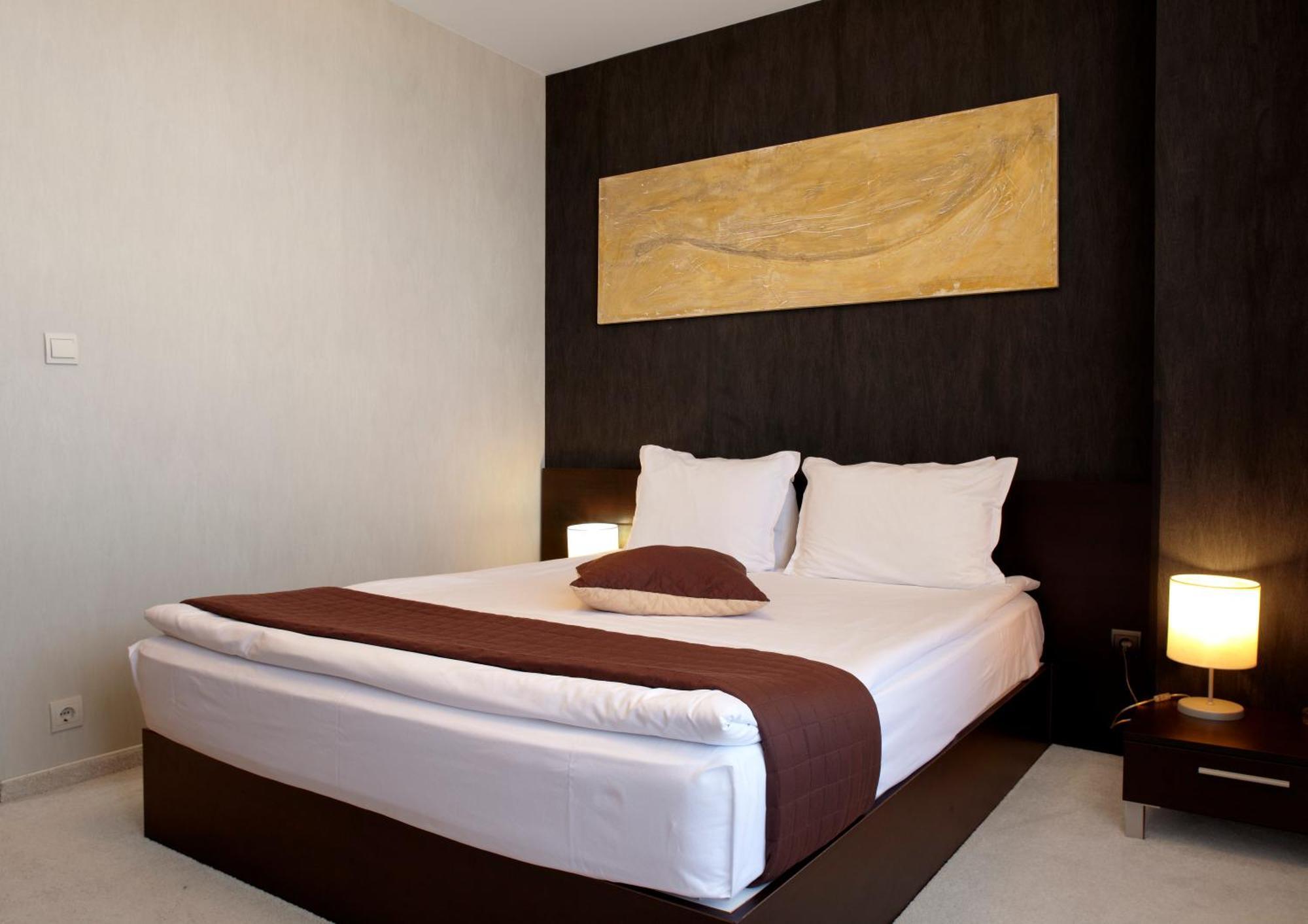 Lucky Bansko Aparthotel Spa & Relax Kültér fotó A bedroom